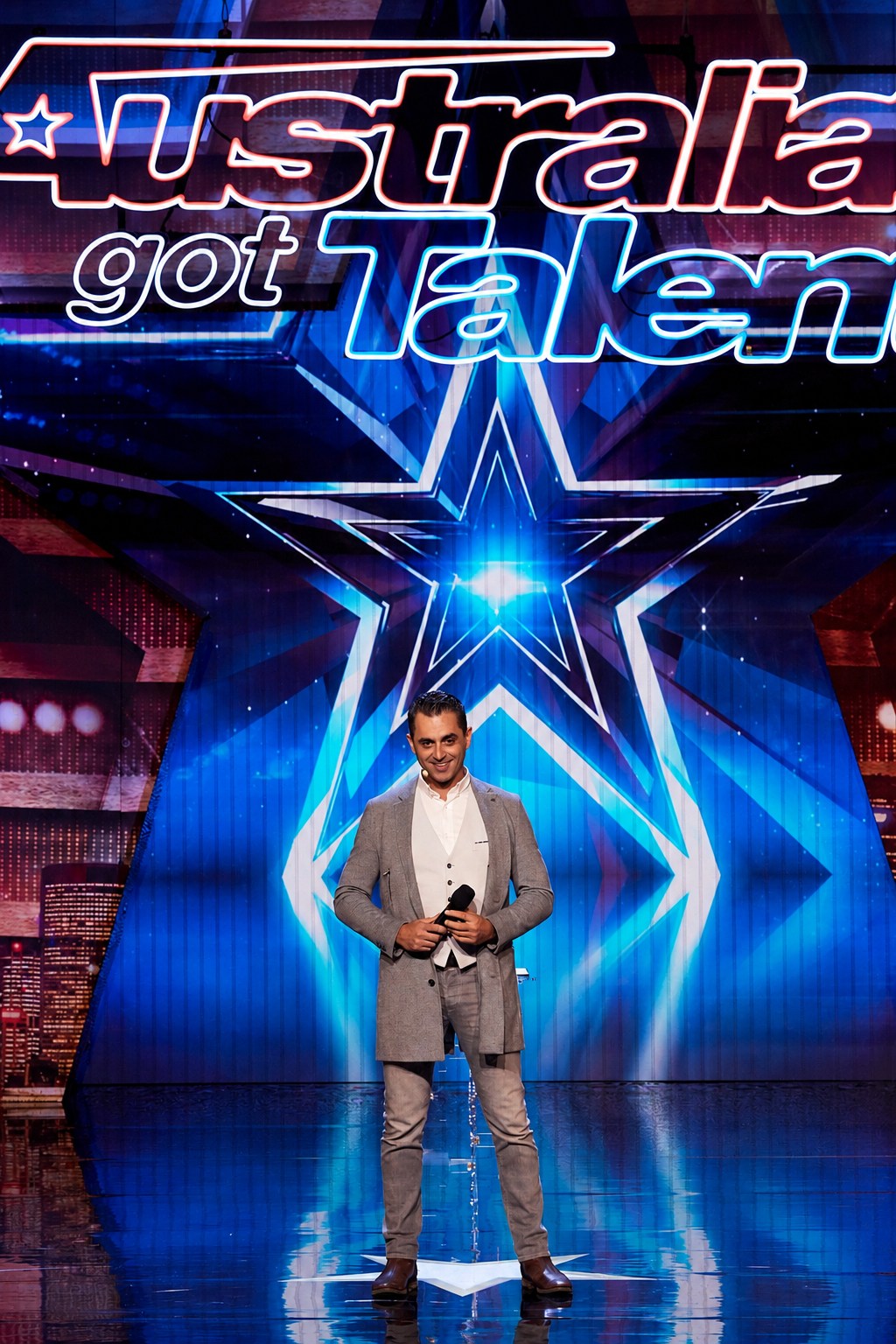 Phoenix alone centre stage beneath the Australia’s Got Talent sign and star